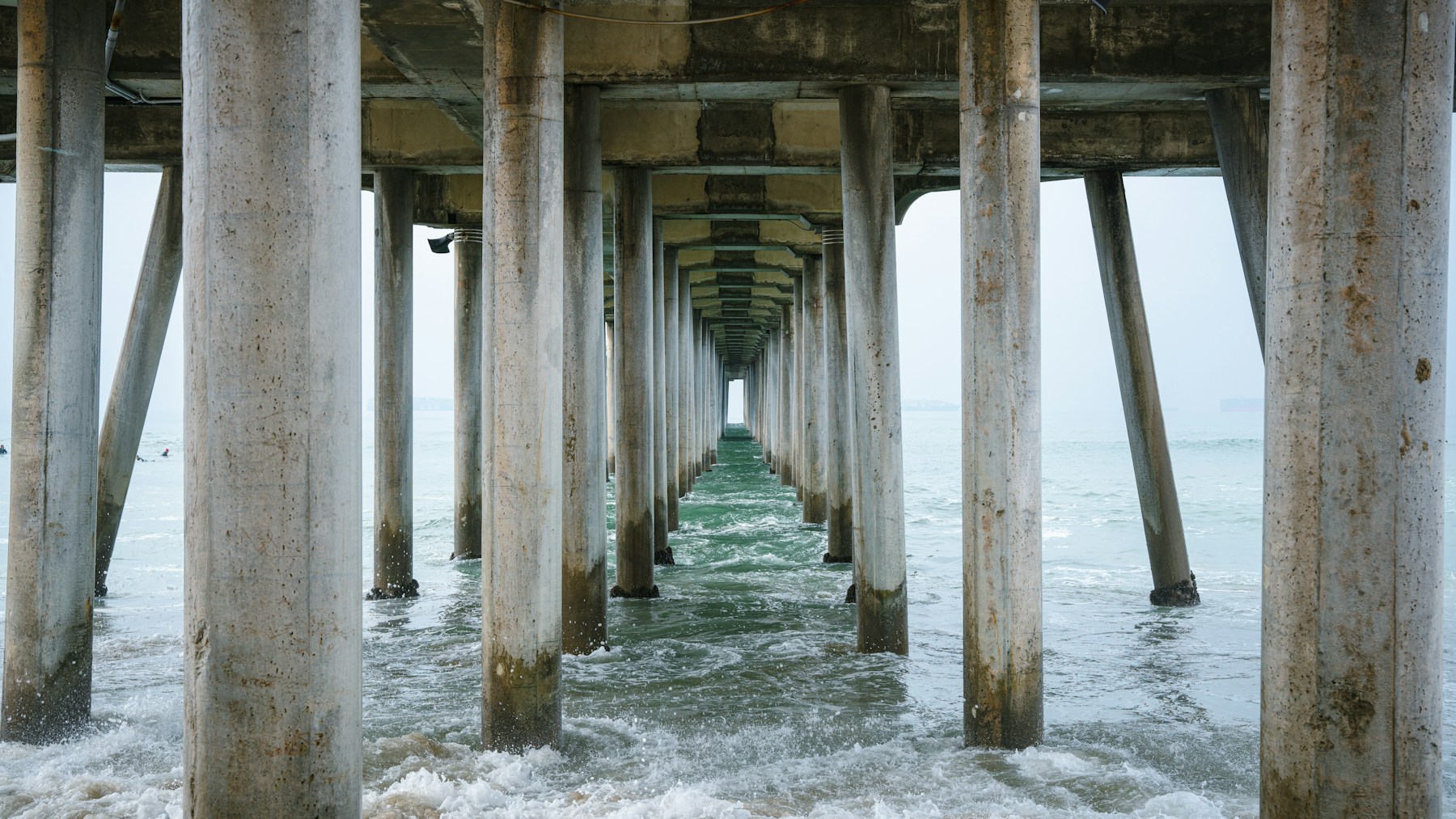 View beneath the Huntington Beach Pier looking out to the Pacific